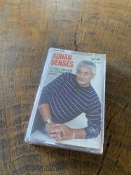 ADNAN ŞENSES - İLK DEFA AĞLADIM / ÇOK ÜZGÜNSÜN ARKADAŞ - KASET (JELATİNİNDE)