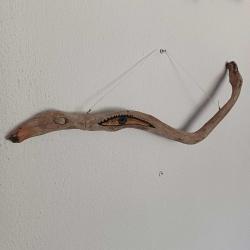 Ahşap yılan formunda nazarlık