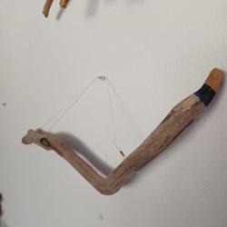 Ahşap yılan formunda nazarlık