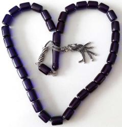 OSMANLI DÖNEMİ MÜCEVHER KUTUSUNDAN YAPILMA İŞIKTA MAVİ RENKLİ MÜTHİŞ İŞÇİLİKLİ MUHTEŞEM GÜMÜŞ PÜSKÜLLÜ SIKMA KEHRİBAR TESPİH 1RR1B1A ÇOK NADİR