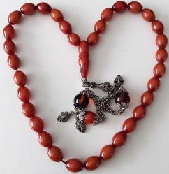 OSMANLI DÖNEMİ OBJEDEN YAPILMA AÇIK KAHVERENGİ MÜTHİŞ İŞÇİLİKLİ YARIM HAVŞALI MUHTEŞEM GÜMÜŞ PÜSKÜLLÜ SIKMA KEHRİBAR TESPİH 2HH1AA1 ÇOK NADİR