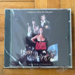 AĞIR ROMAN - ORİJİNAL FİLM MÜZİKLERİ - SOUNDTRACK * ATİLLA ÖZDEMİROĞLU, CEM KARACA, YUSUF TAŞKIN, DEMET SAĞIROĞLU * 1998 * CD * AMBALAJINDA SIFIR