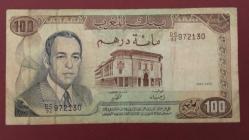 1985 YILI FAS 100 DİRHEM ÇOK NADİR  KONDÜSYONU RESİMDE GÖRÜLDÜĞÜ GİBİDİR.
