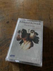 ASMALI KONAK - HAYAT - FİLM MÜZİKLERİ - ÖZCAN DENİZ ŞARKILARIYLA - KASET (JELATİNİNDE)