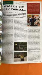 MOTOR BIKE DERGİSİ - MAYIS 2014 — YAMAHA - BMW - KTM - SUZUKI - HONDA - VESPA - HARLEY DAVIDSON - HERO - MONSTER - CERBIS - MOTOVENTO - REDBULL — K HAKKI TOLUNAY - ALEV ALTINKAYNAK ÖZÇİÇEK - BAYRAM BAYRAMÇAVUŞ - ALKAN ALTINKAYNAK - UMUR DELAL - MERTCAN GENÇ - RAHMİ SARUTCUL - SINA AFYONER - ENVER İŞ - MUMTAZ PAK - TAYFUN AKIN - KEMAL BERKER - ALP AKGÜN - GÜLTEN PAK — BMW R1200 GS - KTM 1190 ADVENTURE - SUZUKI V-STROM 1000 ABS - HONDA NM4 VULTUS - BMW K1600 GTL - YAMAHA SUPER TENERE - KTM 450 SX-F — MOTOKROS ŞAMPİYONASI - ENDURO ŞAMPİYONASI - PİST ŞAMPİYONASI - ATV CUP - FIM CROSS COUNTRY - SU JETİ ŞAMPİYONASI - MOTO GP ABD — KARŞILAŞTIRMA TESTLERİ — ARAZİ PERFORMANSI DEĞERLENDİRMESİ — ŞEHİR İÇİ VE UZUN YOL MOTORLARI — YARIŞLARDA TÜRK KATILIMI — TÜRKİYE PİST ŞAMPİYONASI 2. AYAK İZMİR — GÜNCEL MAĞAZA AÇILIŞI — MOTOKROS EĞİTİMİ VE HAZIRLIK — MXGP YARIŞ RAPORU — RODİ PAK YARIŞÇI PROFİLİ — DESTEK SORUNLARI VE YARIŞ GÖZLEMLERİ — YARIŞLARDA ANNE DESTEĞİ — SPONSORLUK MÜCADELESİ — UL - 58 SAYFA