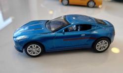 Çek Bırak Araba. Aston Martin One 77. Diecast 1/64 Mavi Metalik Spor Araba. Detaylı Ayrıntılara Sahip Küçük Bir Model Araç, 2014. (Yüksek Kaliteli Plastik Metal Alaşımlı.) Made in China. Koleksiyonluk.