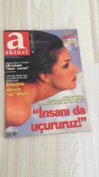 AKTÜEL HAFTALIK HABER DERGİSİ - SAYI:303   -30 NİSAN 1997  -  MELTEM CUMBUL “ÇİFT KUTUPLU SHOW-WOMAN” OLARAK TANITILIYOR – YÖNETMEN ORHAN OĞUZ, SEVGİLİSİ NİLÜFER’İ AKTÜEL İÇİN “ERKEĞİNİN GÖZÜYLE NÜ” FOTOĞRAFLADI – BİLİMADAMLARI “İNSANI DA UÇURURUZ” DİYEREK KURBAĞAYI HAVALANDIRAN DENEYİN MALİYETİNİ AÇIKLADI – EMEKLİ GENERAL ERGİN YURDDAY GAZİ OLAYLARINDA DAYAK YİYEN ÖZLEM TUNÇ’LA YILLAR SONRA YENİDEN BULUŞTU – “ASKERLİKTEN SONRA KAMERA KARŞISINA GEÇEN İLK GENERALİM” DİYEREK OYUNCULUĞA BAŞLADI – GAZİ OLAYLARINDAKİ POLİS ŞİDDETİNİ ELEŞTİRDİ, “DİYALOGLA HER SORUN ÇÖZÜLÜR” MESAJI VERDİ – SİYASETE GİRMEYE HAZIRLANAN YURDDAY “HALK MİLLETVEKİLİNİN EFENDİSİDİR” DİYEREK HYDE PARK PROJESİNİ DUYURDU – “SUSURLUK SADECE BİR AYRINTI” DİYEREK DERİN DEVLET TARTIŞMALARINA FARKLI BİR YORUM GETİRDİ –  MELTEM CUMBUL – ORHAN OĞUZ – NİLÜFER – ERGİN YURDDAY – ÖZLEM TUNÇ – KANDEMİR KONDAK – İSHAK ALATON – MEHMET AĞAR – SEDAT BUCAK – TANSU ÇİLLER – KORKUT EKEN – KAMRAN İNAN – BATUHAN YURDDAY –   130  SAYFA