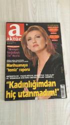 AKTÜEL  HAFTALIK HABER DERGİSİ - SAYI:348 - 19-25 MART 1998 -    CHE GUEVARA’NIN BİLİNMEYEN FOTOĞRAFLARIYLA ÖZEL ALBÜM – DÜNYA SAĞLIK ÖRGÜTÜ’NDEN MARIHUANA RAPORU – GENETİK SEÇİMLE “SIFIR HATALI BEBEK” YÖNTEMİ – NEWVAL SEVİNDİ’YLE KADINLIK VE DÜŞMANLIK KÜLTÜRÜ ÜZERİNE – İNSAN SORUMLULUKLARI EVRENSEL BİLDİRGESİ – INTERACTION COUNCIL’İN 21. YÜZYIL VİZYONU – TED TURNER’IN KÜRESEL PROJE FİNANSMANI – UYGARLIKLAR ÇATIŞMASI VE ETİK SİSTEMLER – BATI VE ASYA ARASINDA İNSAN ONURU TARTIŞMASI – NIHAT BEHRAM’IN SÜRGÜN YILLARI – “DAR AĞACINDA ÜÇ FİDAN” BELGESELİ – 12 MART VE 6 MAYIS İDAMLARI – DENİZ GEZMİŞ VE ARKADAŞLARININ SON GÜNLERİ – YILMAZ GÜNEY’İN KAÇIŞI VE DÖNÜŞÜ – TÜRKİYE’DE BASKI DÖNEMLERİ VE EDEBİYATIN TANIKLIĞI -  NEWVAL SEVİNDİ – TED TURNER – HELMUT SCHMIDT – VALERY GISCARD D’ESTAING – FELIPE GONZALEZ – SALIM AL-HOSS – KENNETH KAUNDA – LEE KUAN YEW – KICHI MIYAZAWA – MISAEL PASTRANA BORRERO – SIMON PERES – MARIA DE LOURDES PINTASSILGO – JOSE SARNEY – SHIN HYON HWAK – 154  SAYFA