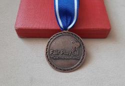 TÜRKİYE MİLLİ OLİMPİYAT KOMİTESİ FAİR PLAY HİZMET MADALYASI C1867