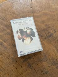 ASMALI KONAK - HAYAT - FİLM MÜZİKLERİ - ÖZCAN DENİZ ŞARKILARIYLA - KASET (JELATİNİNDE)