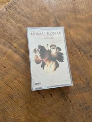 ASMALI KONAK - HAYAT - FİLM MÜZİKLERİ - ÖZCAN DENİZ ŞARKILARIYLA - KASET (JELATİNİNDE)