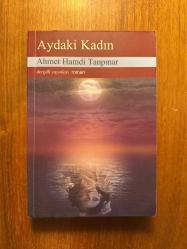 Aydaki Kadın [Yazarın Ölümünden Sonra Dağınık Müsveddelerinden Tekrar İnşa Edilmiştir]