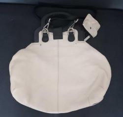 İNCİ MARKA KREM RENK ORJİNAL DERİ KADIN ÇANTASI.  KONDİSYON YÜKSEK