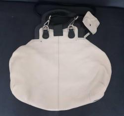 İNCİ MARKA KREM RENK ORJİNAL DERİ KADIN ÇANTASI.  KONDİSYON YÜKSEK