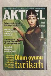 YENİ AKTÜEL  HAFTALIK HABER DERGİSİ - SAYI:27 - 2006 - 17-23 OCAK - 250 BİN ŞARKI SİZİN: KORSANLIK YAPMADAN – SELİMİYE'NİN TAŞI İÇİN EDİRNE'YE ADAK TURU – ŞİMDİ MODA: EVYAPIMI KOZMETİK – AKP'Lİ FIRAT DEMİREL, BAYKAL VE DÜLGER'İ BOMBALADI – UZMANI UYARDI: SİZDEKİ EN YENİ GRİP VİRÜSÜ – SUSURLUK SKANDALI MÜZİKAL OLDU – 10 MİLYON KİŞİ SANAL OYUN BAĞIMLISI: BİRİ ÇOK YAKININIZDA OLABİLİR – ÖLÜM OYUNU TARİKATI – CİNAYETLERİYLE MUTLULUK SAÇTI – SEN GİT BEN DÜŞÜNME – BEYAZ PALTOLU POLİS: ORHAN PAMUK DURUŞMASINDA – MODERNLİK DİNDEN SERT – KUŞ GRİBİ GÜNEYE İNECEK – İRAN’A HOŞGELDİNİZ – KENDİNİ YAK, KİLONU YAK – İLHAM PERİSİ SCARLETT JOHANSSON – CAMİDE ADAK TURİZMİ – EVDE KREM ÜRETİMİ – SARIŞIN GÖLGE – MUTLULUĞUN CİNAYİ FORMÜLLERİ – ÇATLI’NIN BİR İSMİ DAHA OLDU – MO-YAP ARŞİVLERİ: KORSANSIZ 250 BİN ŞARKI – EROL EVGİN’İN KARİKATÜRLERİ – YANARAK ZAYIFLAMA YÖNTEMİ – ONLINE OYUNLAR: 7/24 EKRAN BAŞINDA YAŞAM – SCARLETT & TRAVOLTA SÖYLEŞİSİ – ASTROLOJİ – SUDOKU – BELMACA – AJANDA  - MİR DENGİR  98 SAYFA