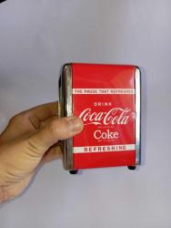 Coca cola metal pecetelik
