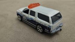 2000 CHEVROLET SUBURBAN K-9  MATCHBOX  2012 YILI SIFIR    HİÇ KULLANILMAMIŞ 1/64 ÖLÇEK KOLEKSİYON ÜRÜNÜ