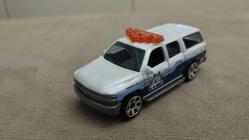 2000 CHEVROLET SUBURBAN K-9  MATCHBOX  2012 YILI SIFIR    HİÇ KULLANILMAMIŞ 1/64 ÖLÇEK KOLEKSİYON ÜRÜNÜ