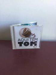 Cd AQUI TEM TOM