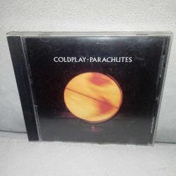 Efemera - Cd Coldplay Parachutes albümü. Orijinal. Avrupa Baskı. Dinlemeyi etkilemeyen çizikler var. Kartonet tertemiz. Sorunsuz çalışıyor. - kitantik - kitaLog
