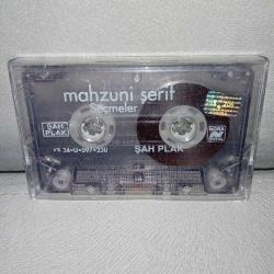 Kaset Aşık Mahzuni Şerif seçmeler. Orijinal Şah plak. Kartoneti yok. Sorunsuz çalışıyor. Son fotoğraf şarkı listesine aittir.