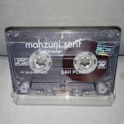 Kaset Aşık Mahzuni Şerif seçmeler. Orijinal Şah plak. Kartoneti yok. Sorunsuz çalışıyor. Son fotoğraf şarkı listesine aittir.