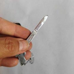 mini silah formunda çakı anahtarlık