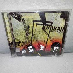 Cd Kurban İnsanlar albümü. Orijinal. Kartonet tertemiz. Disk 10 üzerinden 9.5 koleksiyonluk