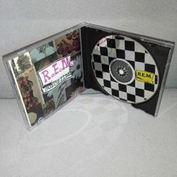 Cd Rem out of time albümü. Orijinal 1991 Amerikan baskı. Disk 10 üzerinden 9,5 iyi durumda koleksiyonluk