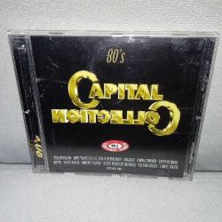 Cd Capital collection 80's. Orijinal. iyi durumda koleksiyonluk. John Travolta Olivia Newton John, Queen, Koll & the gang, duran duran, erasure, baltimore, donna summer, Opus, yello, Depeche Mode, David bowie, Robert palmer, Dennis Edwards, Dexy midnight runners, talking heads, rockwell, Lionel Richie, Jim diamond