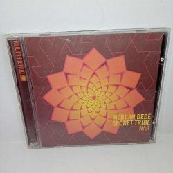 CD Mercan Dede secret tribe nar albümü. Dinlemeyi etkilemeyen çizikler var.