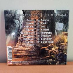 Cd Serdar Ortaç kara kedi albümü. Orijinal. kitapçık yok. dinlemeyi etkilemeyen çizikler var. Sorunsuz çalışıyor