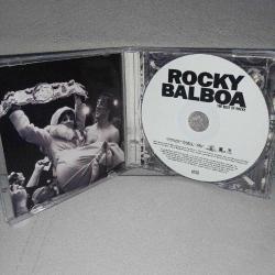 Cd the best of rocky balboa soundtrack albüm. Orijinal. Avrupa baskı. Nadir. Dinlemeyi etkilemeyen çizikler var. Sorunsuz çalışıyor.