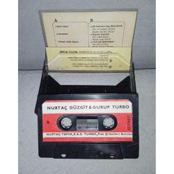 Kaset Nurtaç Düzgit grup turbo, mavi mavi. Oijinal dönem kağıt baskı. Koleksiyonluk