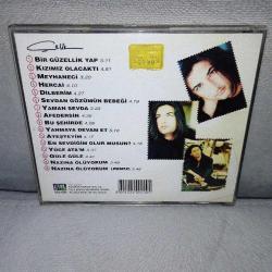 Cd Çelik, sevgilerimle albümü. Orijinal. 1998 sarı bandrollü dönem baskı. Dinlemeyi etkilemeyen yoğun çizikler var. Sorunsuz çalışıyor