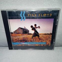 Cd Pink Floyd a collection of great dance songs albümü. Orijinal. Avrupa baskı. Dinlemeyi etkilemeyen yoğun çizikler var. Sorunsuz çalışıyor