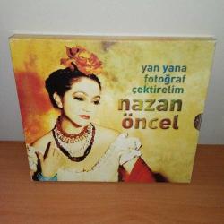 CD Nazan öncel yan yana fotoğraf çektirelim, hay hay. Orijinal. Sorunsuz çalışıyor