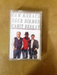 CEM KARACA / UĞUR DİKMEN / CAHİT BERKAY - YİYİN EFENDİLER - KASET / Açıklamayı okuyunuz