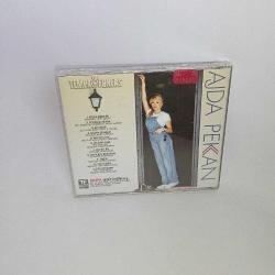CD Ajda Pekkan eğlen güzelim Orijinal 1996 kırmızı bandrollü dönem albümü. Sorunsuz çalışıyor.