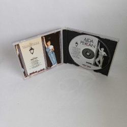 CD Ajda Pekkan eğlen güzelim Orijinal 1996 kırmızı bandrollü dönem albümü. Sorunsuz çalışıyor.