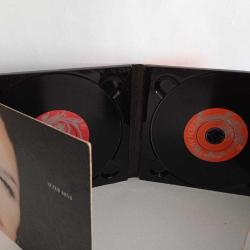 CD Sezen Aksu bahane remixes albümü. Orijinal. 2 cd. kitapçığı yok. Sorunsuz çalışıyor.