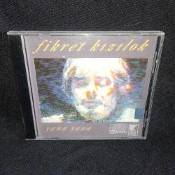CD Fikret Kızılok yana yana albümü. Orijinal. 1993 KALAN müzik. Dinlemeyi etkilemeyen yoğun çizikler var. Sorunsuz çalışıyor