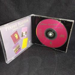 CD Fikret Kızılok yana yana albümü. Orijinal. 1993 KALAN müzik. Dinlemeyi etkilemeyen yoğun çizikler var. Sorunsuz çalışıyor