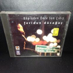 CD Feridun Düzağaç köprüden önce son çıkış. Orijinal. 1998 sarı bandrollü dönem baskı albüm. Sorunsuz çalışıyor.