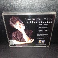 CD Feridun Düzağaç köprüden önce son çıkış. Orijinal. 1998 sarı bandrollü dönem baskı albüm. Sorunsuz çalışıyor.