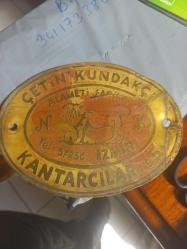 Prinç tabela Çetin Kundakçı Alameti  Faika Kantarcılar No:5  Aslan figürlü N ve K harfleri bulunan  İzmir tabelası  12.5 X9.5 cm büyüklüğünde oval