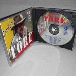 Cd Cem Karaca Töre albümü. Orijinal. 1994 Odeon baskı. Sarı bandrollü dönem baskı albüm. Disk 10 üzerinden 9. koleksiyonluk