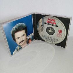 Cd Orhan Gencebay yalnız değilsin Albümü. orijinal. Kervan & Odeon 1994 sarı bandrollü dönem baskı albüm. Disk 10 üzerinden 9 koleksiyonluk
