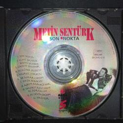 Cd Metin Şentürk son nokta. 1996 raks orijinal kırmızı bandrollü dönem baskı albüm. dinlemeyi etkilemeyen çizikler var. Sorunsuz çalışıyor.