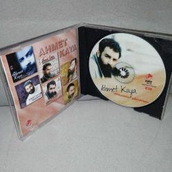 Cd Ahmet Kaya dokunma yanarsın. Orijinal. 1992 dönem baskı. Aşanlar Müzik. Dinlemeyi etkilemeyen yoğun çizikler var. Baştan sona dinlendi sorunsuz çalışıyor.